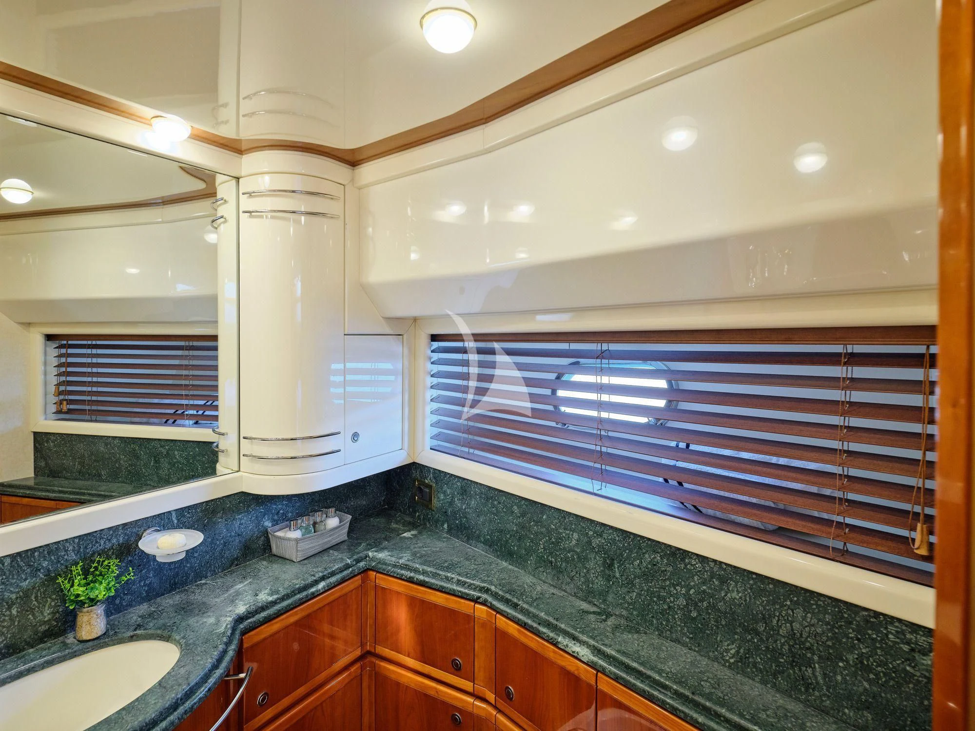 a kitchen with a large window aboard ESTIA YI Yacht for Sale