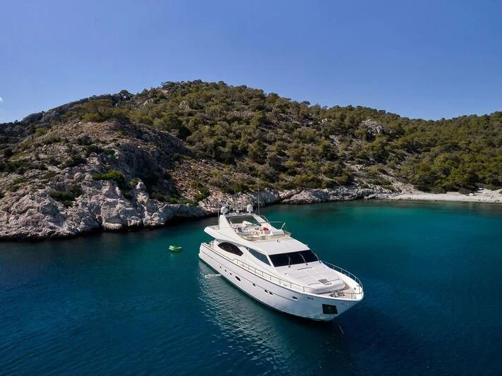 a white yacht in the water aboard ESTIA YI Yacht for Sale