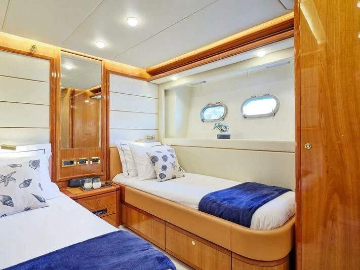 a couple of beds in a room aboard ESTIA YI Yacht for Sale
