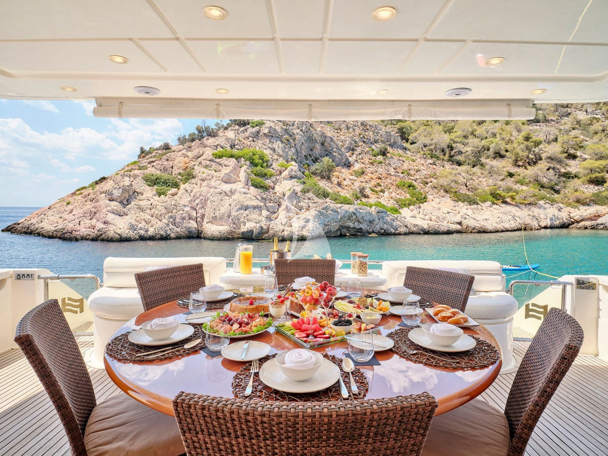 a table set for a meal aboard ESTIA YI Yacht for Sale