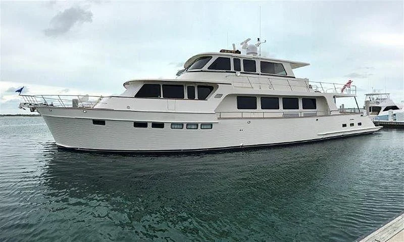 a large white boat in the water aboard GRACIE Yacht for Sale
