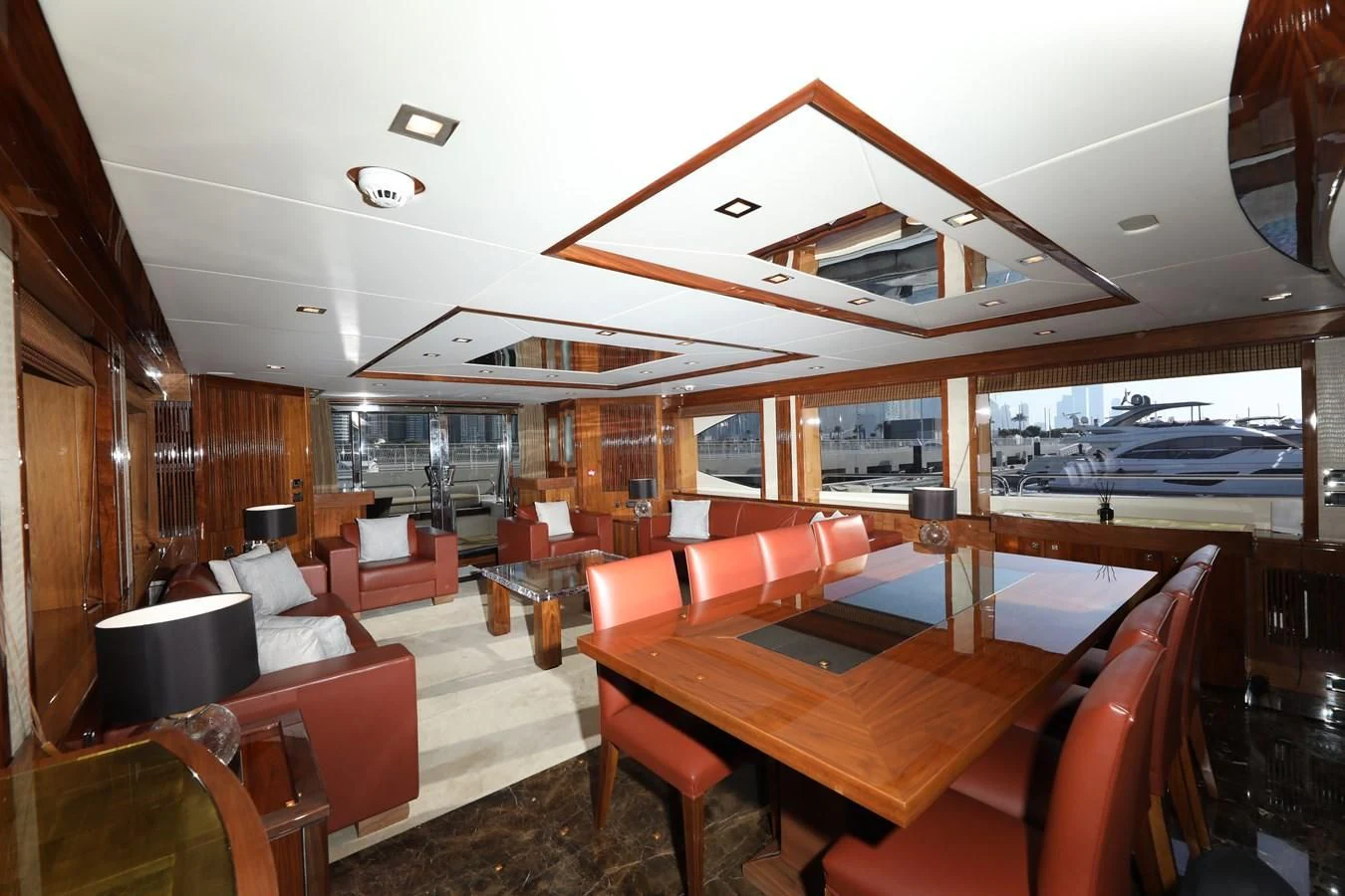 a room with a table and chairs aboard SUNSEEKER 30M Yacht for Sale