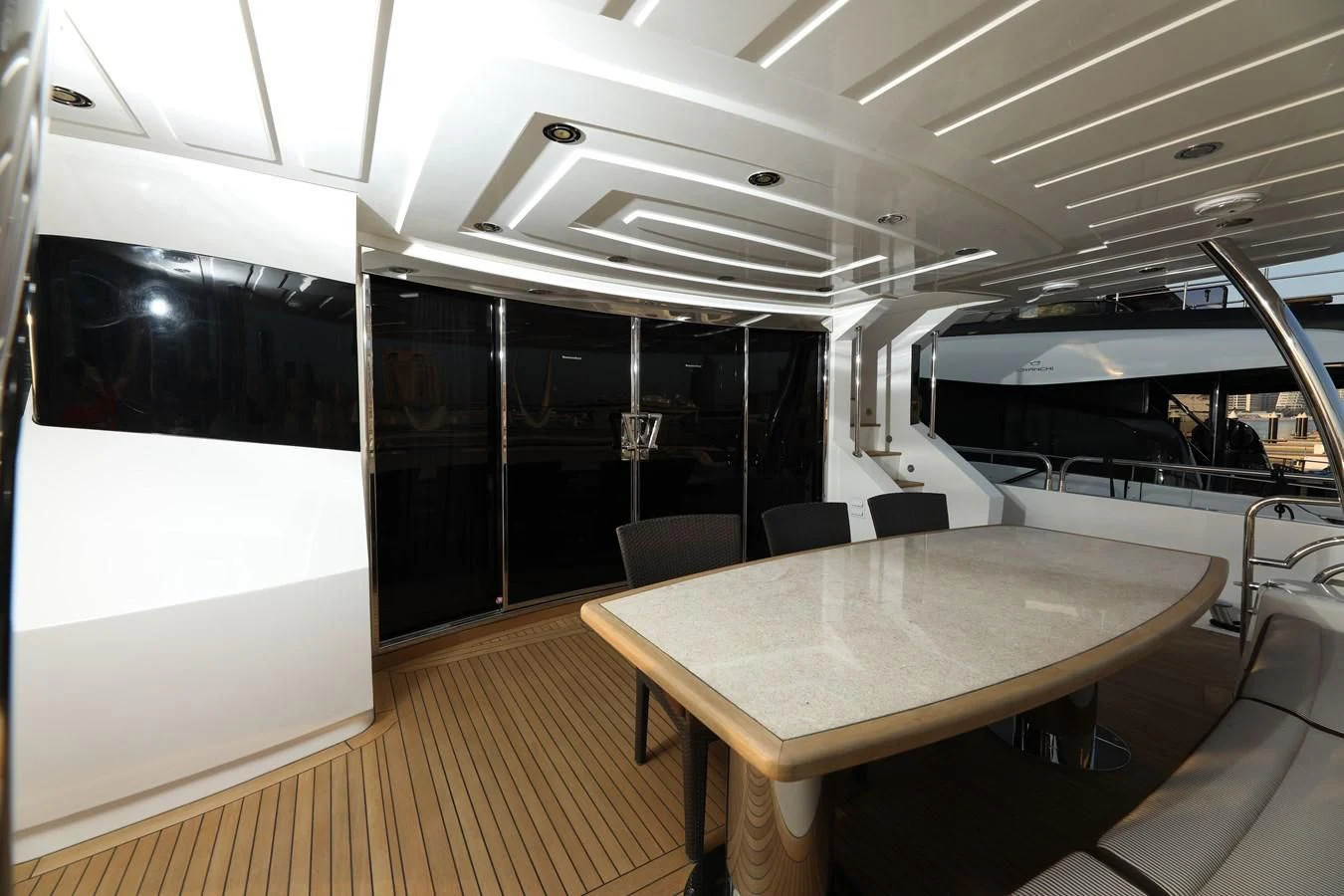 a room with a table and chairs aboard SUNSEEKER 30M Yacht for Sale