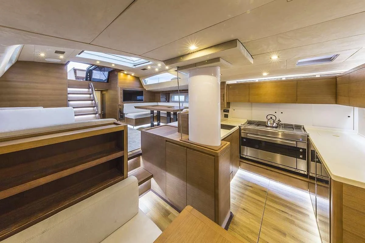 a kitchen with a large island aboard JIKAN Yacht for Charter
