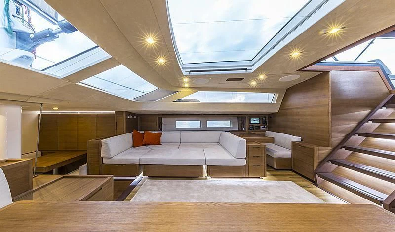 a modern looking living room aboard JIKAN Yacht for Charter