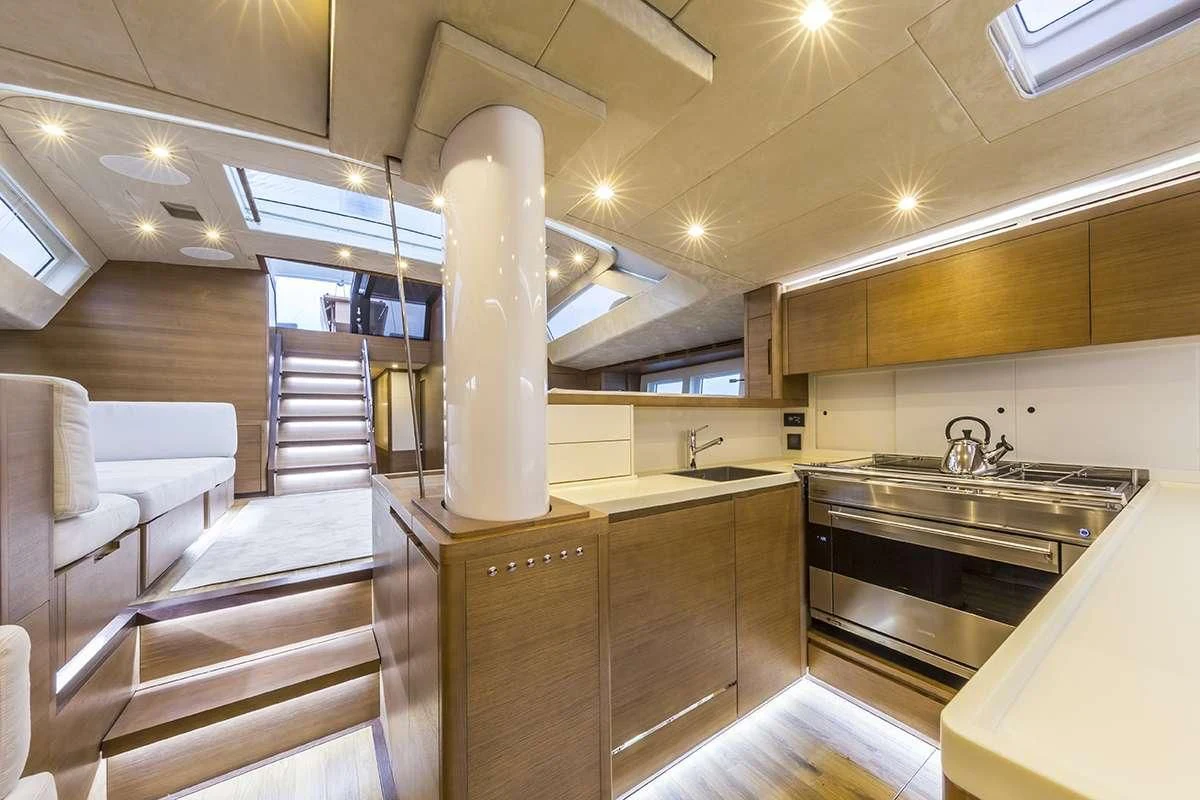 a kitchen with a large white object on the ceiling aboard JIKAN Yacht for Charter