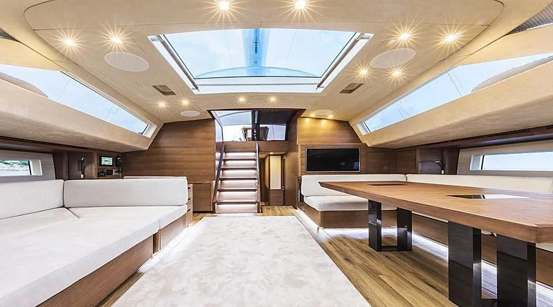 a room with a bed and a desk aboard JIKAN Yacht for Charter