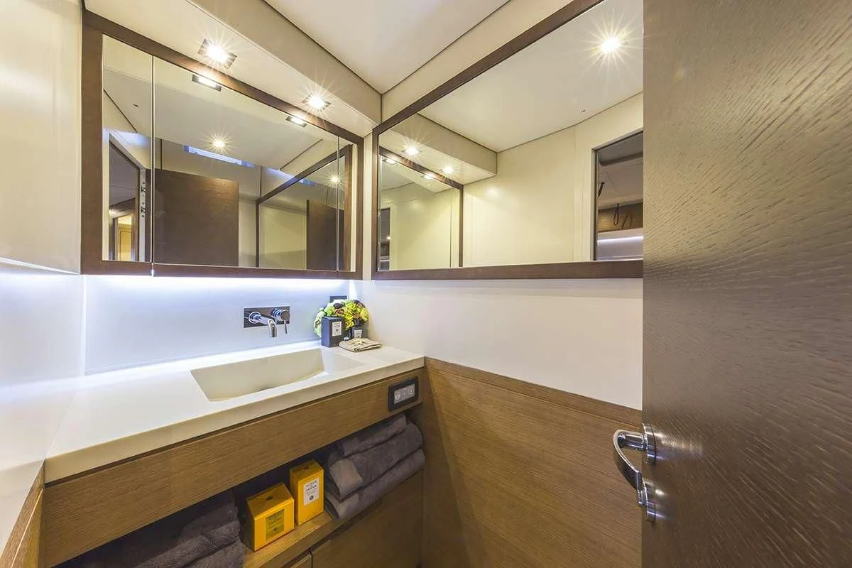 a bathroom with two sinks aboard JIKAN Yacht for Charter
