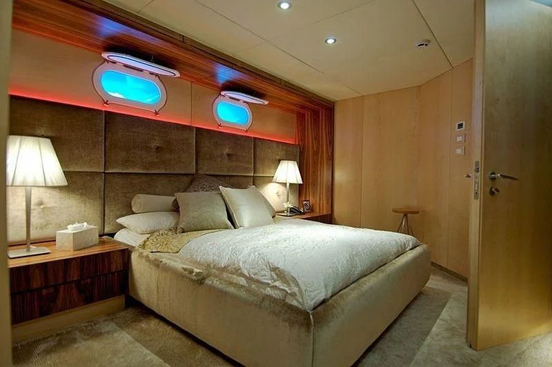 a bed in a room aboard TANGO Yacht for Sale