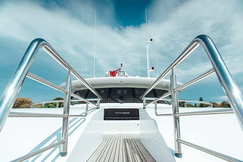 a person on a boat aboard TANGO Yacht for Sale