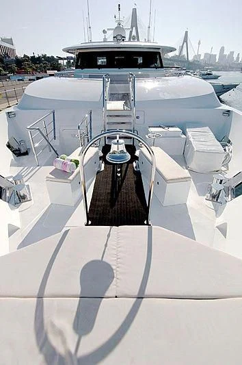 a deck with a boat on it aboard TANGO Yacht for Sale