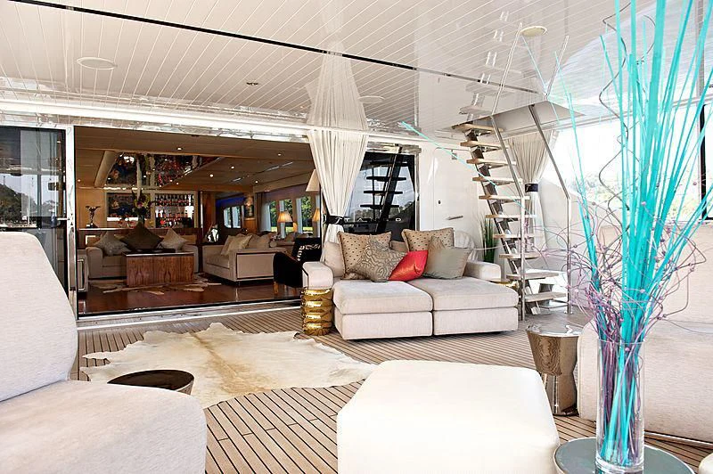 a living room with a large glass window aboard TANGO Yacht for Sale