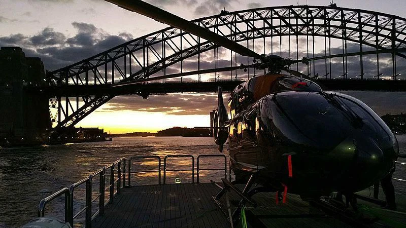 a helicopter on a deck aboard TANGO Yacht for Sale