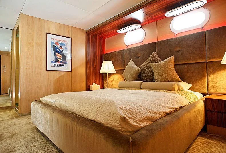 a bed in a room aboard TANGO Yacht for Sale