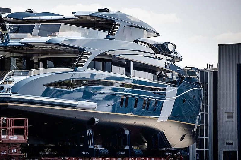 a large yacht docked aboard PHI Yacht for Sale