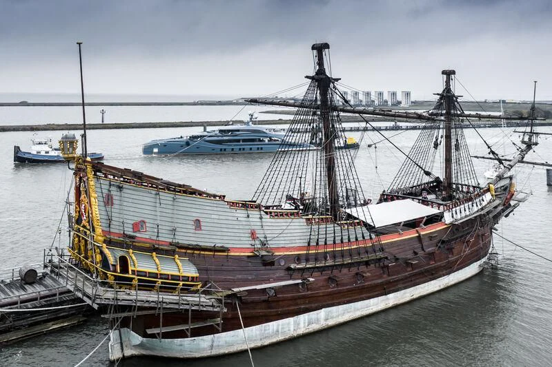 a large ship in the water aboard PHI Yacht for Sale