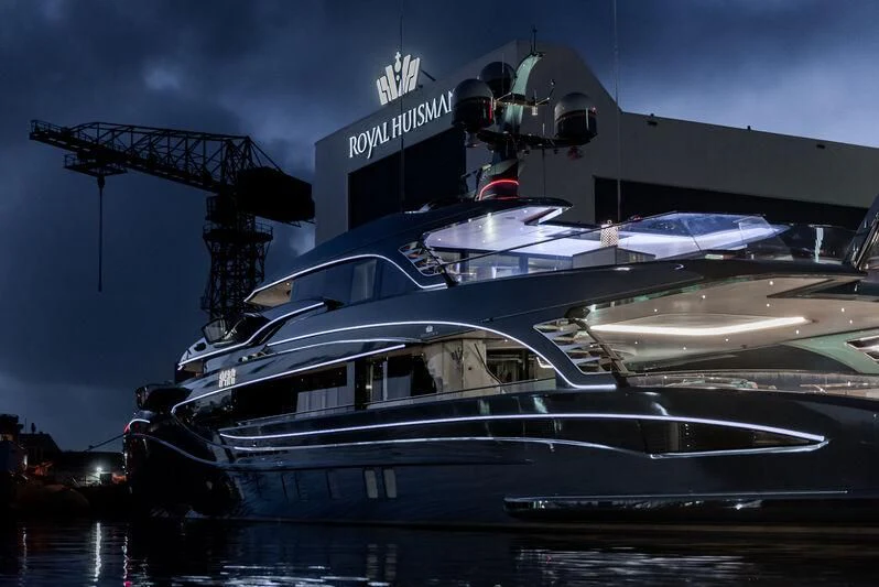 a boat with a helicopter on it aboard PHI Yacht for Sale