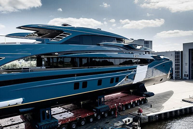 a boat docked at a pier aboard PHI Yacht for Sale