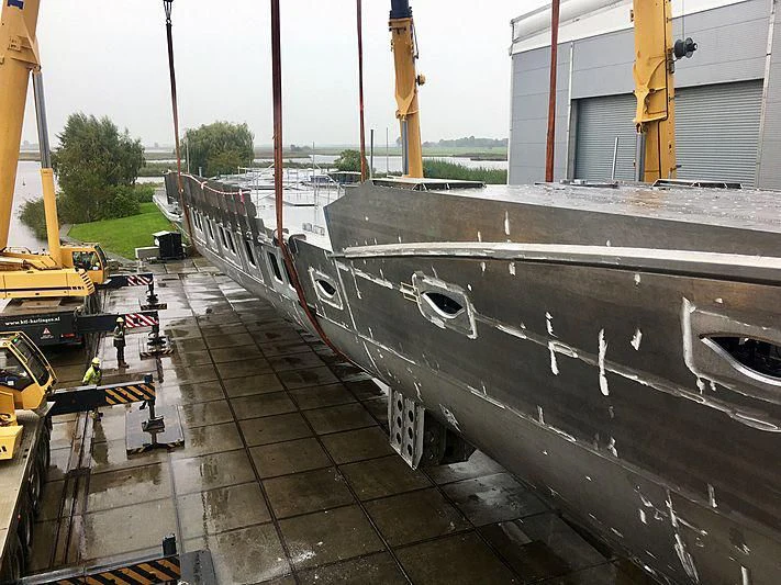 a large grey tank on a brick surface aboard PHI Yacht for Sale