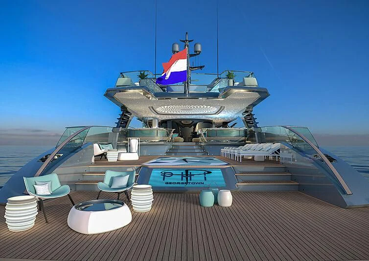 a deck with a pool table and chairs on it aboard PHI Yacht for Sale