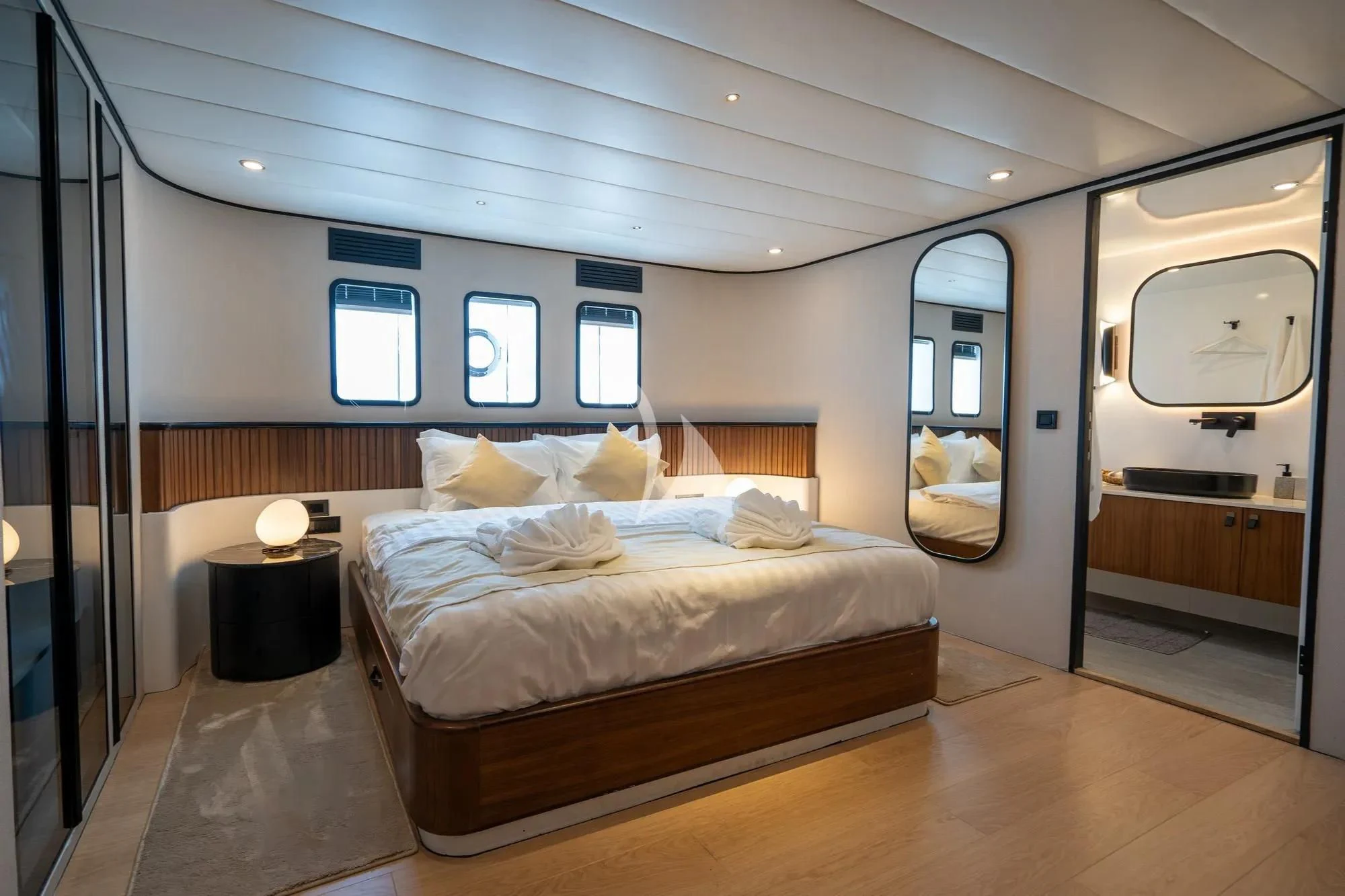 a bed in a room aboard DE LOVE Yacht for Charter