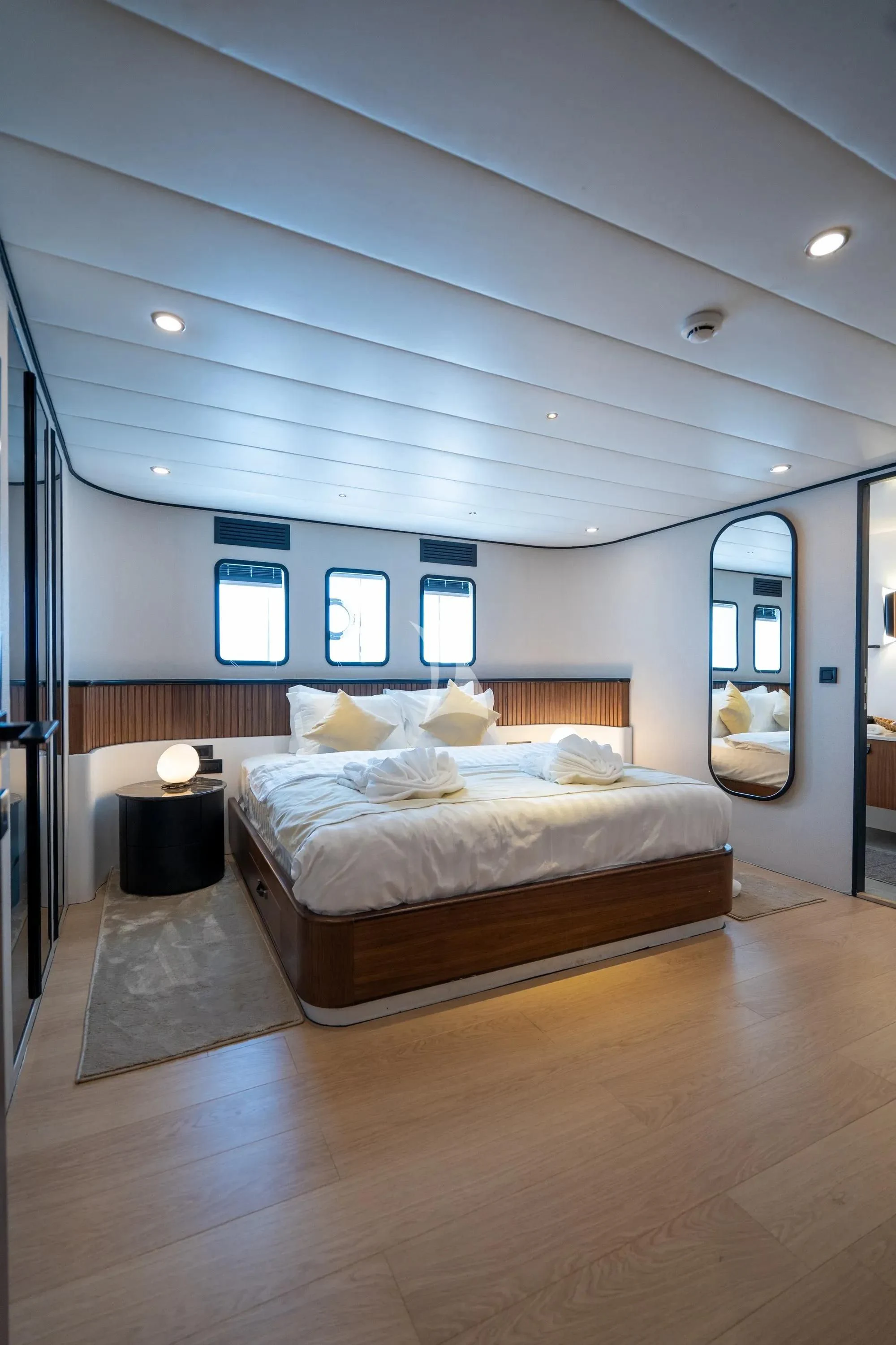 a bedroom with a large bed aboard DE LOVE Yacht for Charter