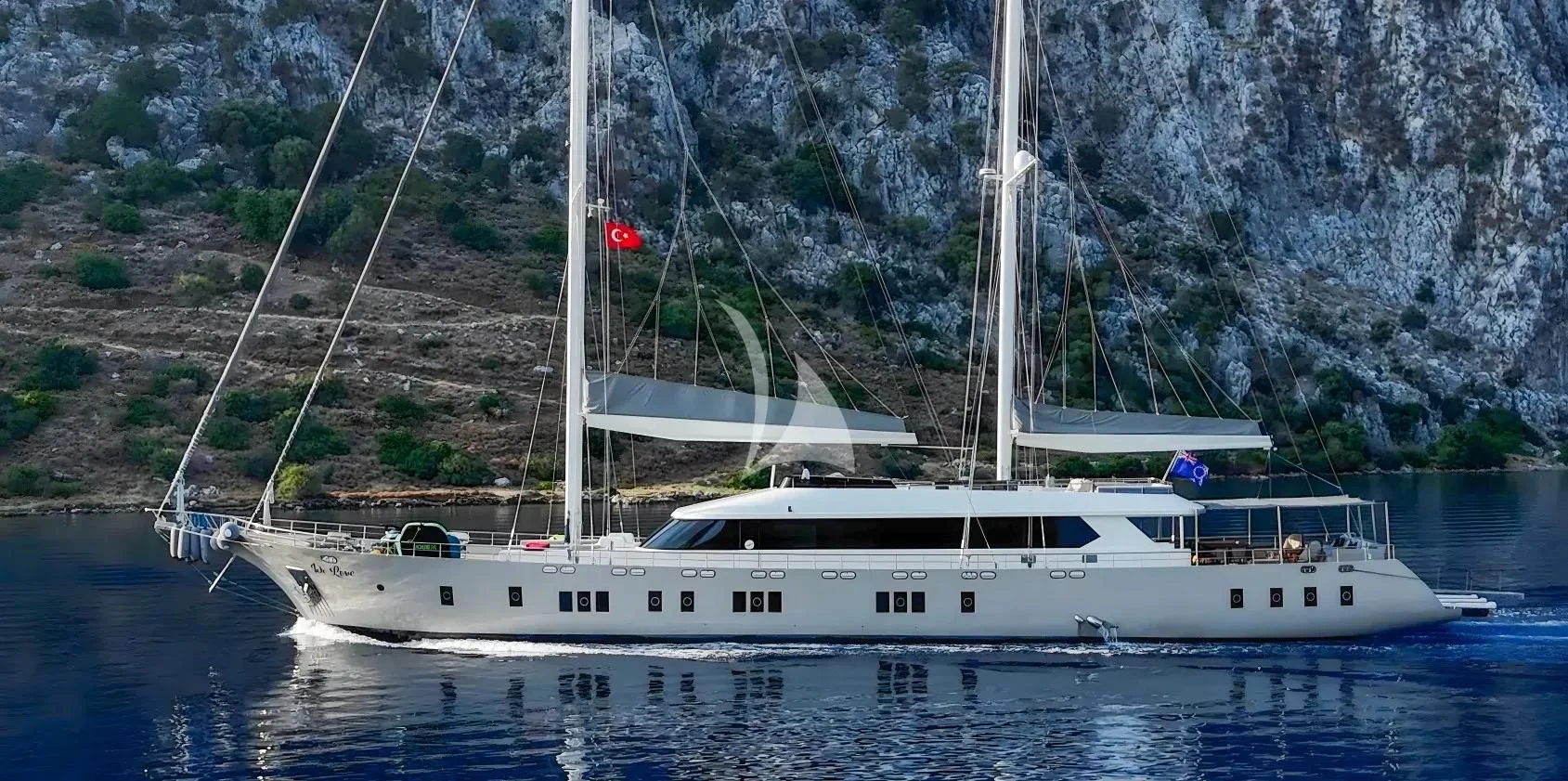 a white boat in the water aboard DE LOVE Yacht for Charter