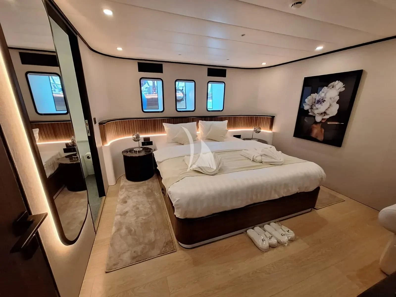 a bed in a room aboard DE LOVE Yacht for Charter