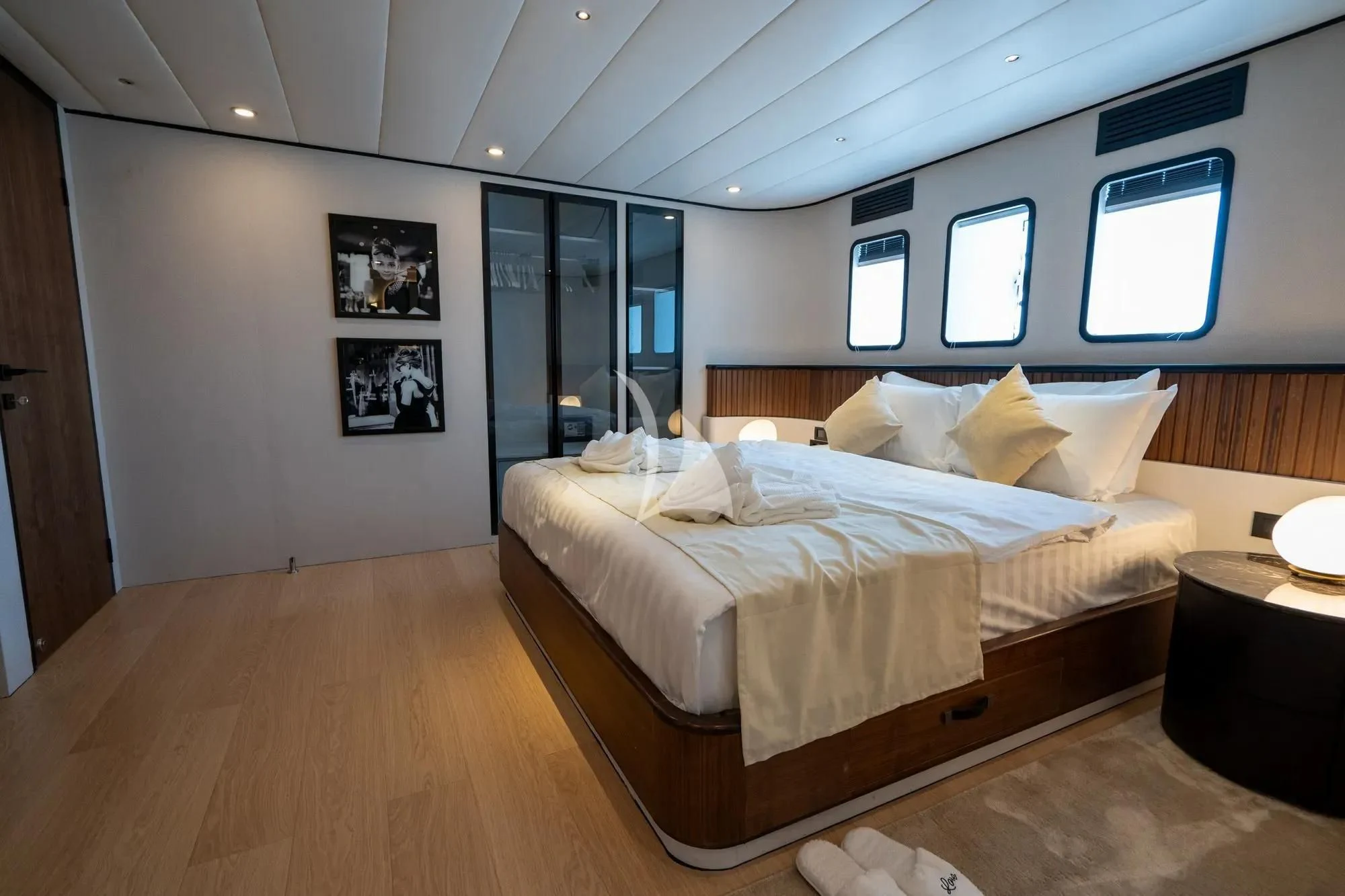 a bed in a room aboard DE LOVE Yacht for Charter