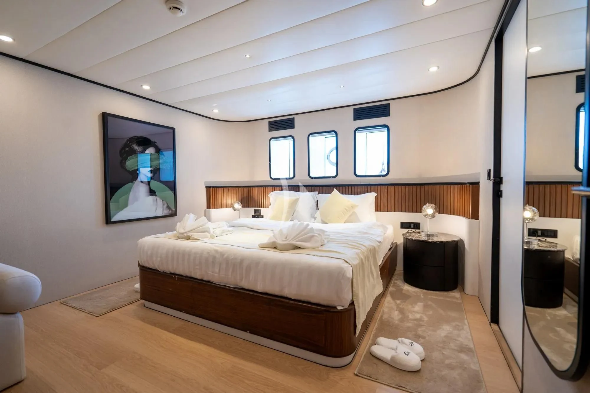 a bedroom with a large bed aboard DE LOVE Yacht for Charter