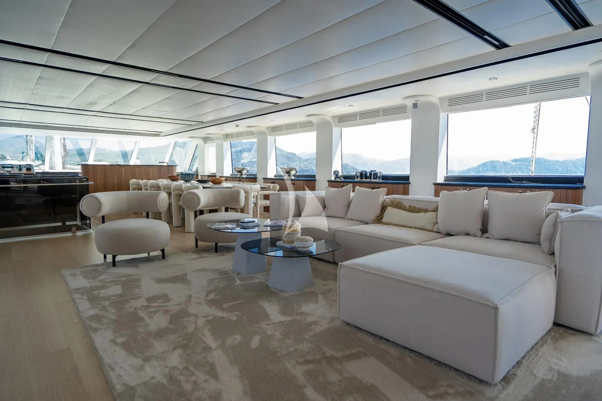 a living room with a large window aboard DE LOVE Yacht for Charter