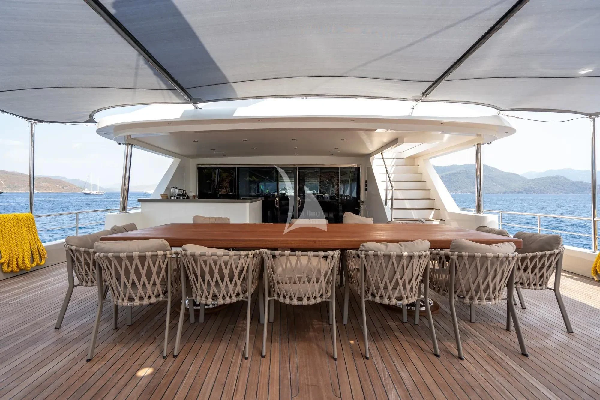 a table set up on a deck aboard DE LOVE Yacht for Charter