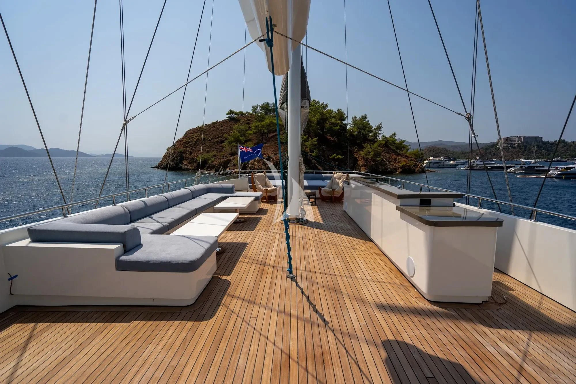 a deck with a boat on it aboard DE LOVE Yacht for Charter