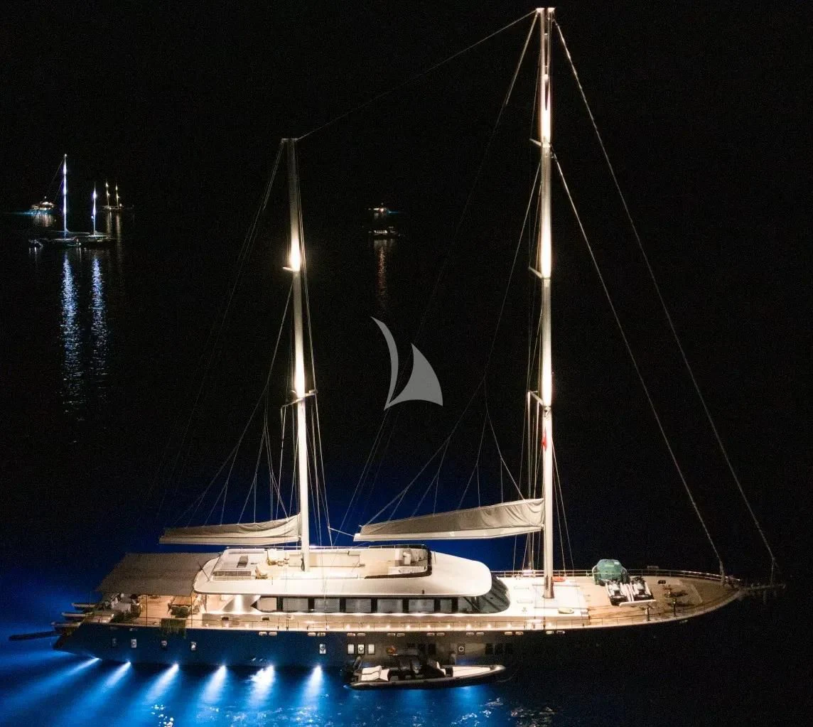 a sailboat with a white crescent on it aboard DE LOVE Yacht for Charter