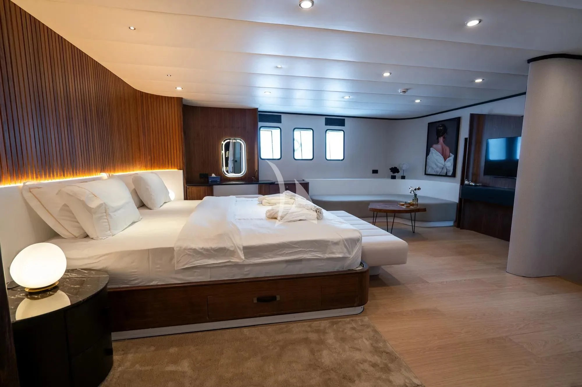 a bedroom with a large bed aboard DE LOVE Yacht for Charter
