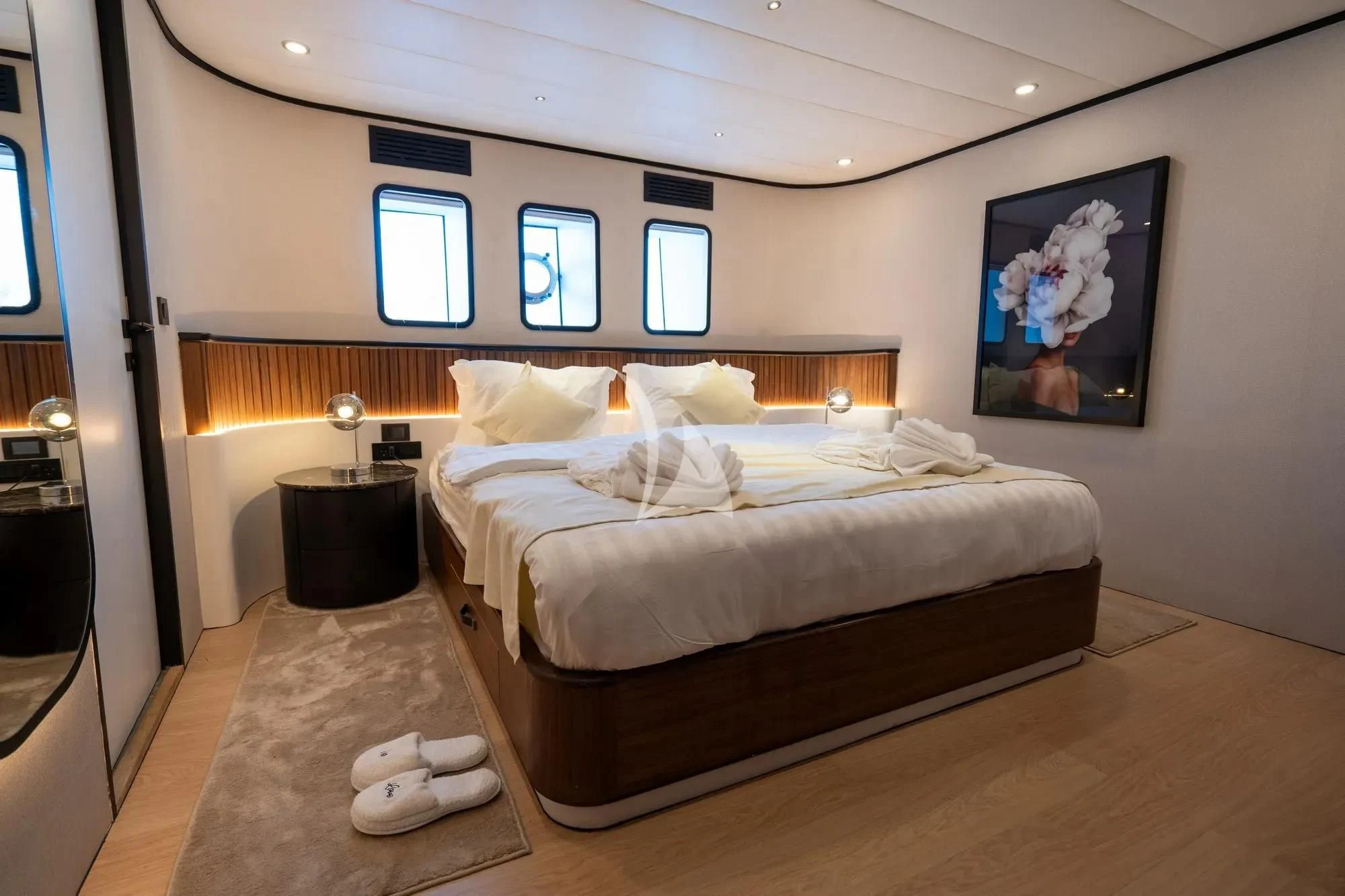 a bed in a room aboard DE LOVE Yacht for Charter