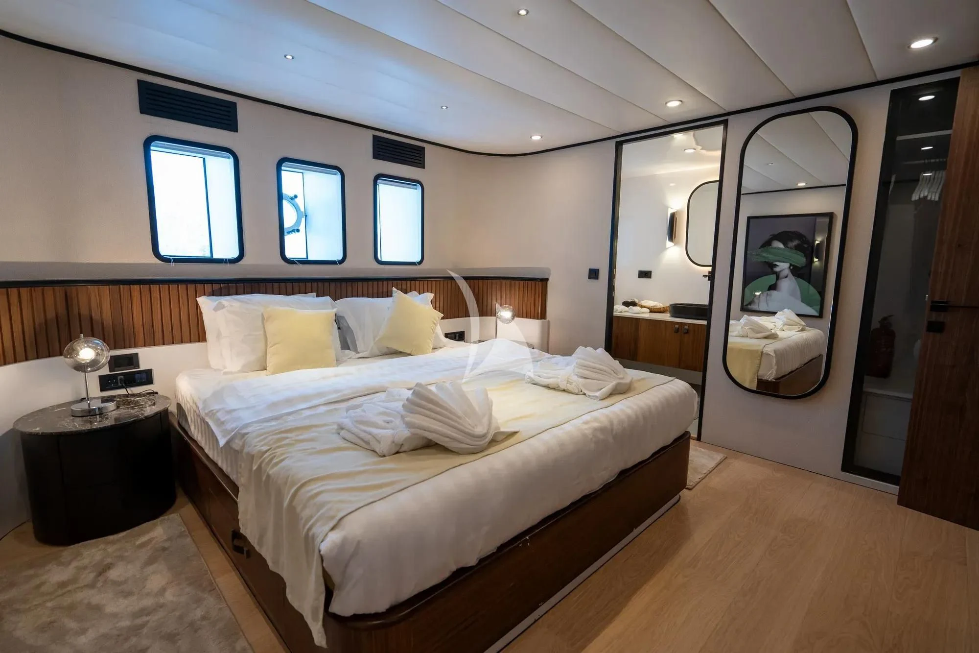 a bedroom with a large bed aboard DE LOVE Yacht for Charter