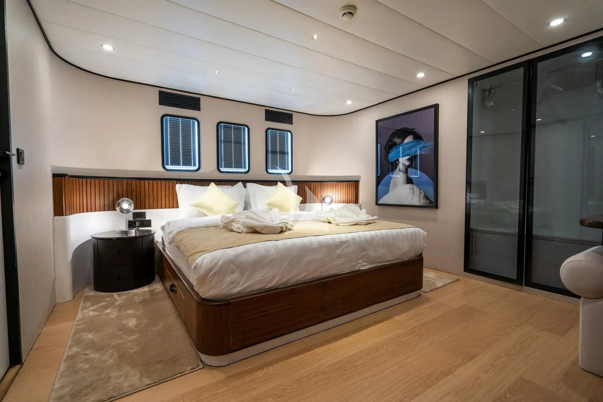 a large bed in a room aboard DE LOVE Yacht for Charter