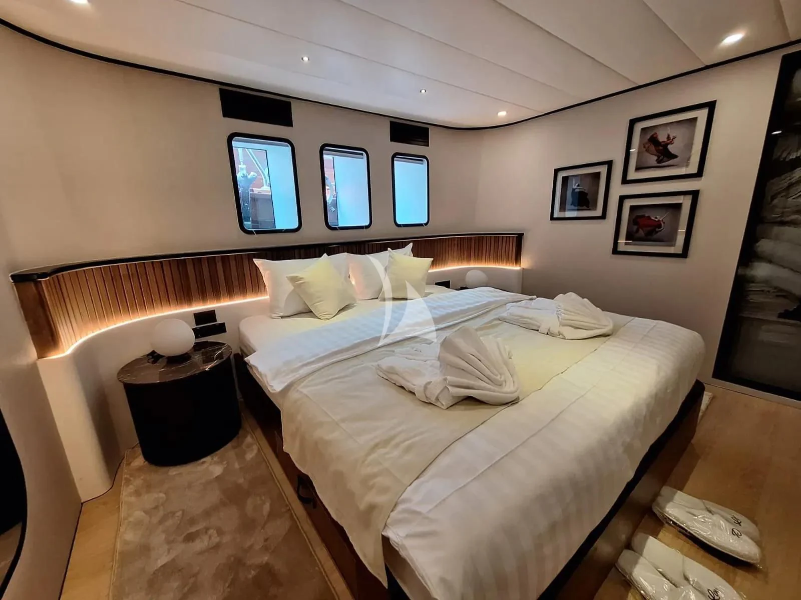 a hotel room with two beds aboard DE LOVE Yacht for Charter