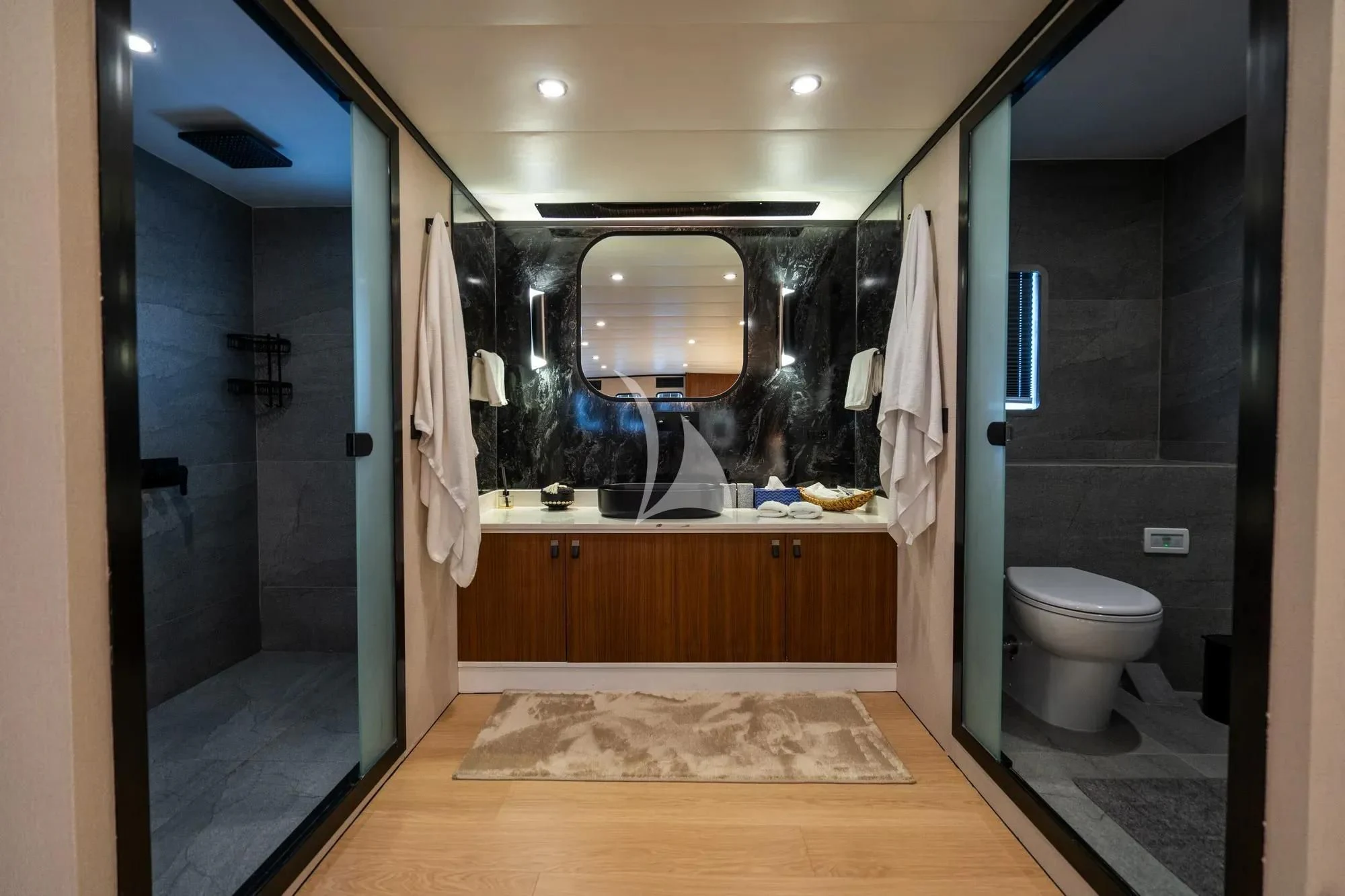 a bathroom with a large mirror aboard DE LOVE Yacht for Charter