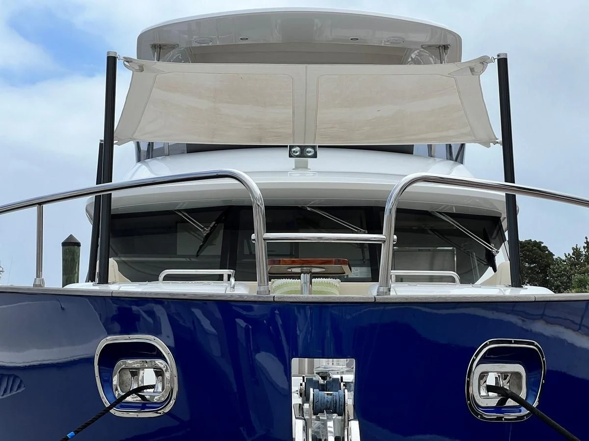 a boat with a canopy aboard PURA VIDA Yacht for Sale