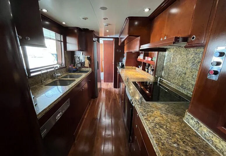 a kitchen with a large island aboard ANYPA Yacht for Sale