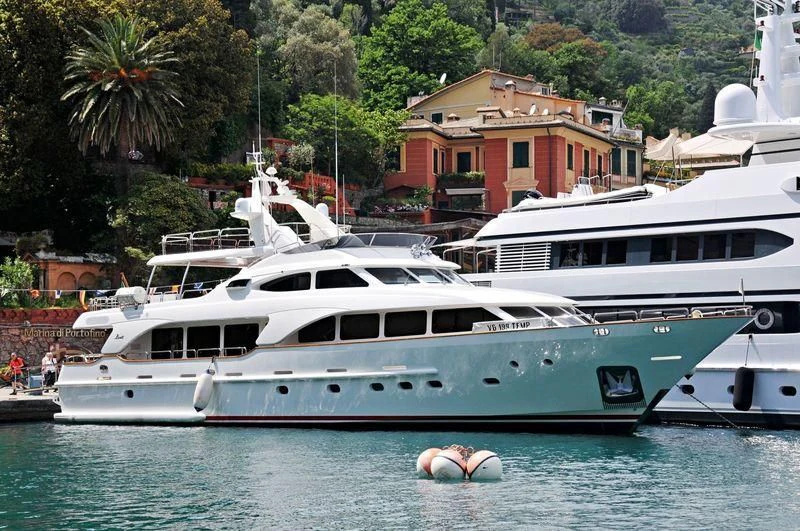 a couple of boats in a harbor aboard ANYPA Yacht for Sale