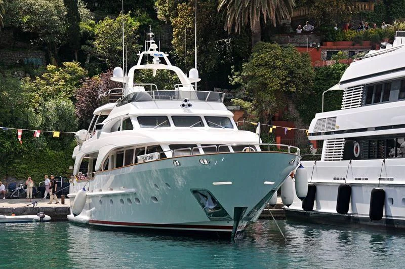 a couple of boats are parked in the water aboard ANYPA Yacht for Sale