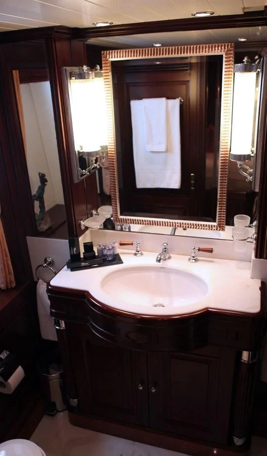 a bathroom with a large mirror aboard ANYPA Yacht for Sale