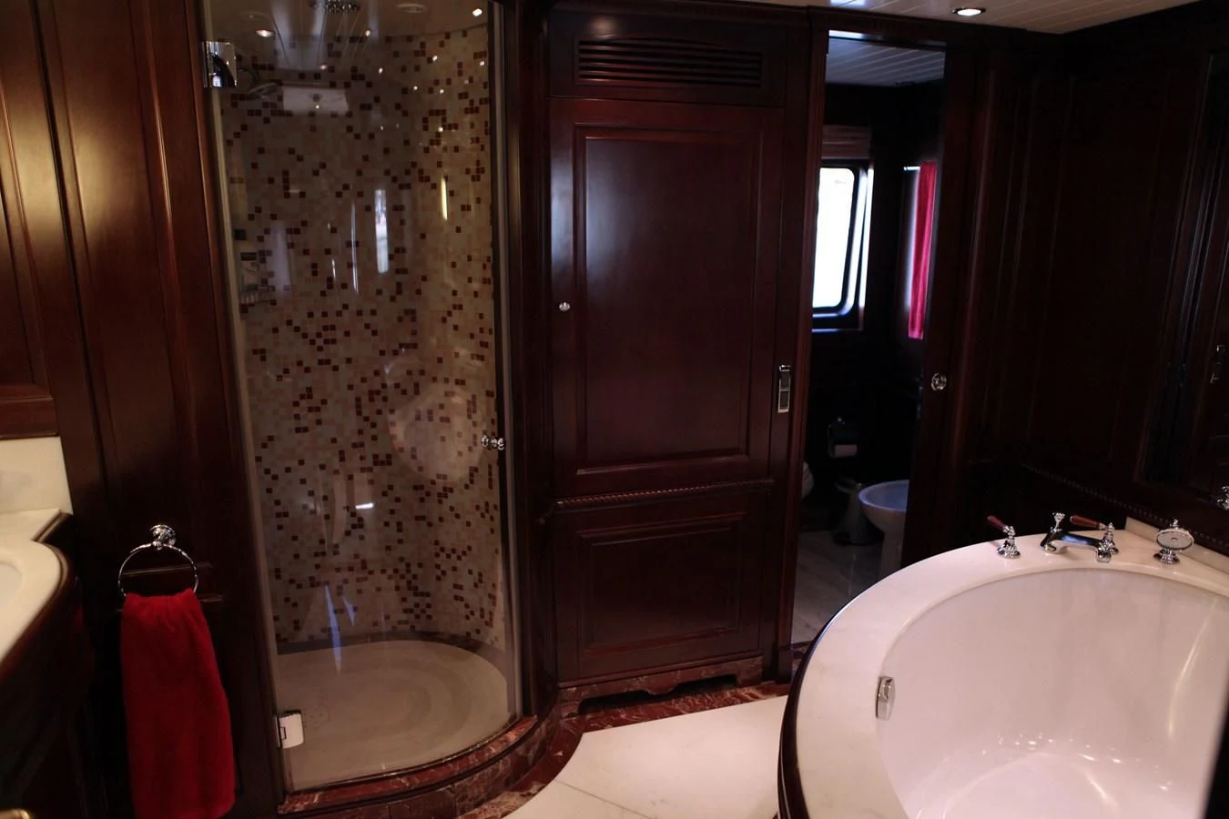a bathroom with a bathtub and shower aboard ANYPA Yacht for Sale
