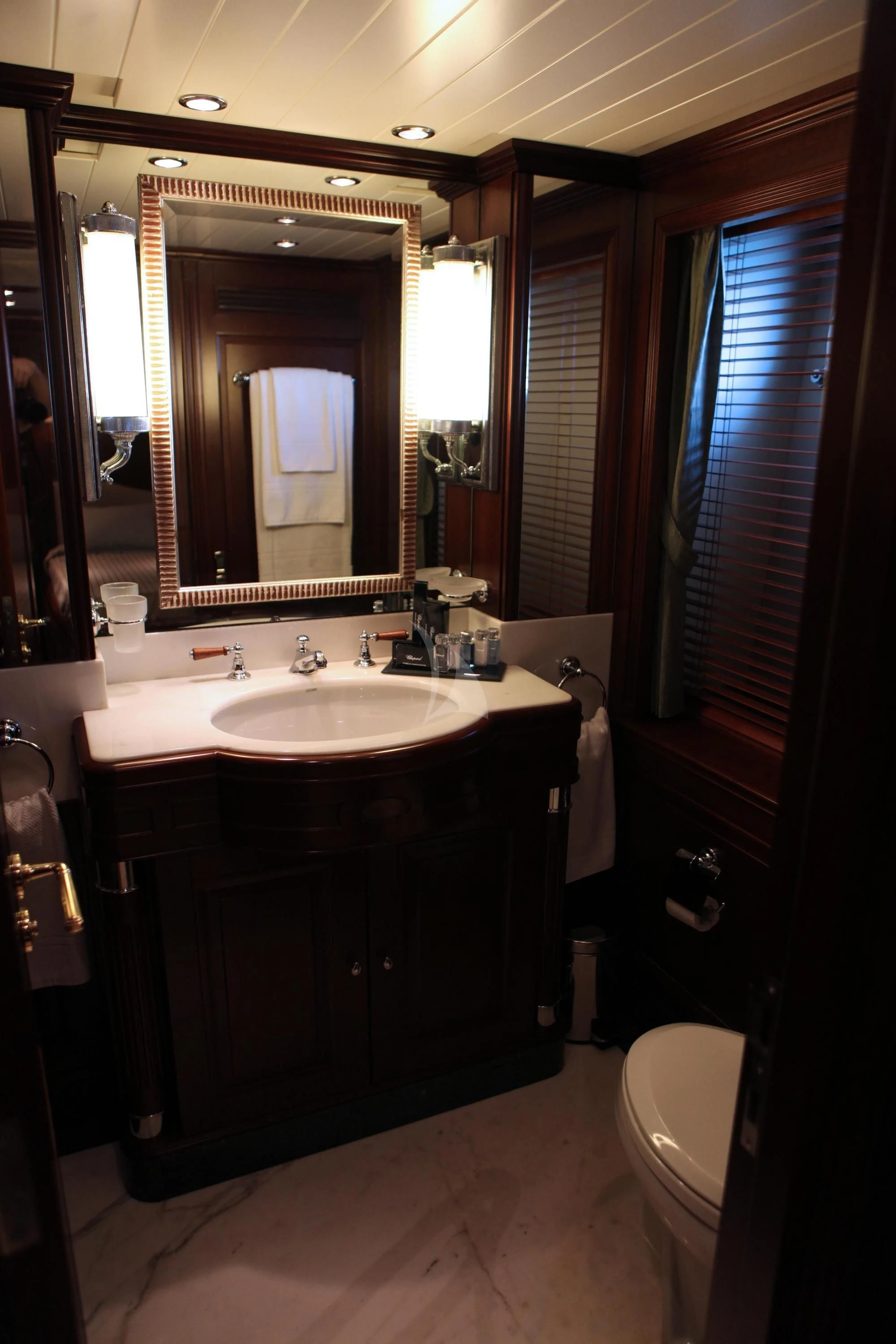 a bathroom with a sink and a mirror aboard ANYPA Yacht for Sale