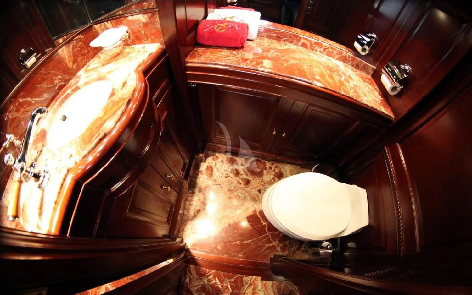a room with a large mirror and a counter with a lamp on it aboard ANYPA Yacht for Sale