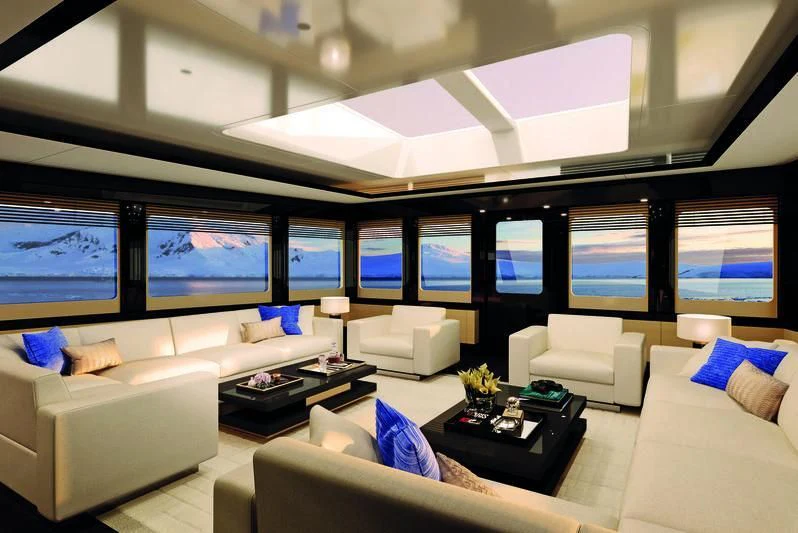a room with a couch and a tv aboard PINK SHADOW Yacht for Sale