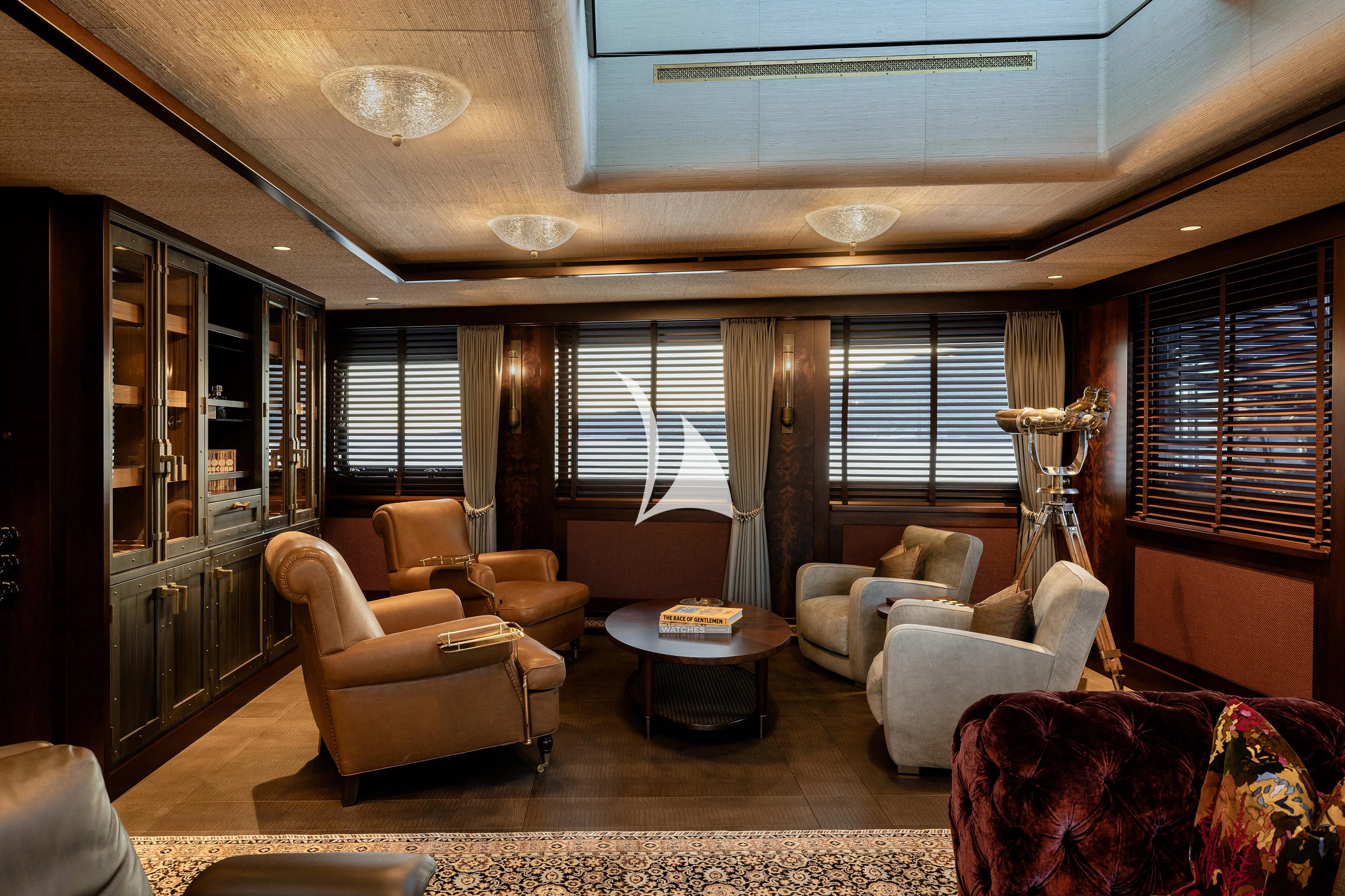 a living room with a large window aboard PINK SHADOW Yacht for Sale